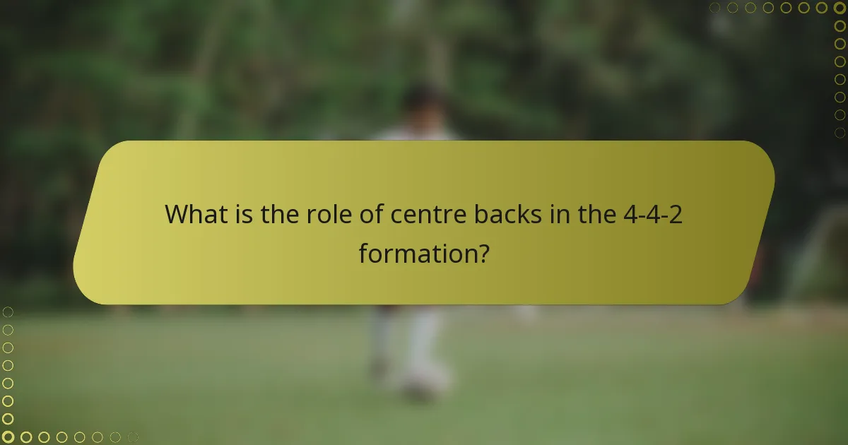 What is the role of centre backs in the 4-4-2 formation?